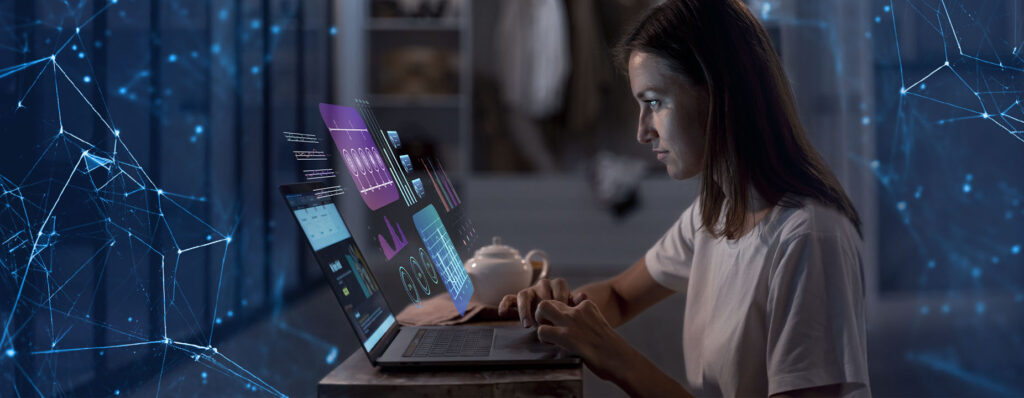 Mulher concentrada em um laptop, analisando gráficos digitais em um ambiente futurista com elementos de tecnologia e dados.